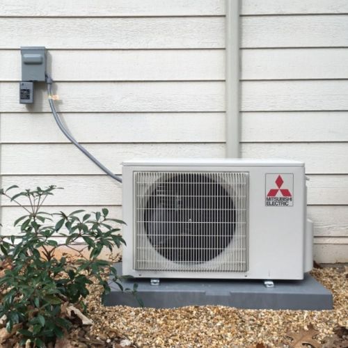 Outside mini split unit connected to power switch