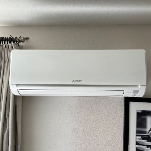 Mini-Split inside unit on walll of living room