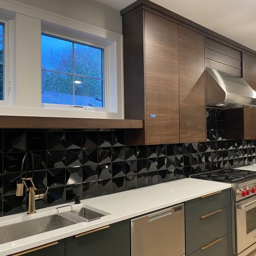 Kitchen sink, stove and hood