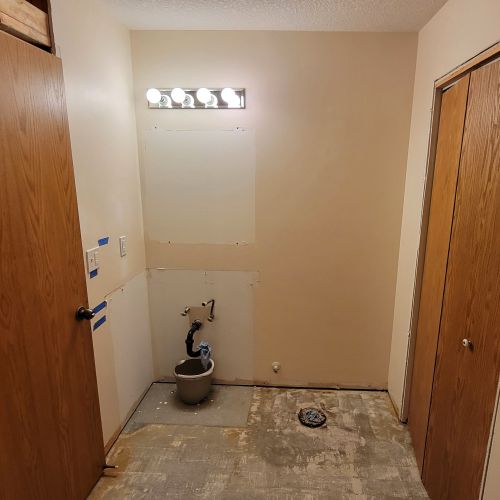 Bathroom with sink and toilet removed