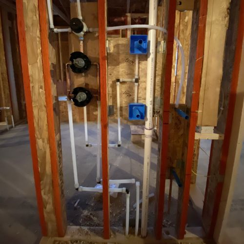 Rough in plumbing of pipes ready for fixtures