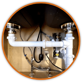 White drain pipes for two sinks