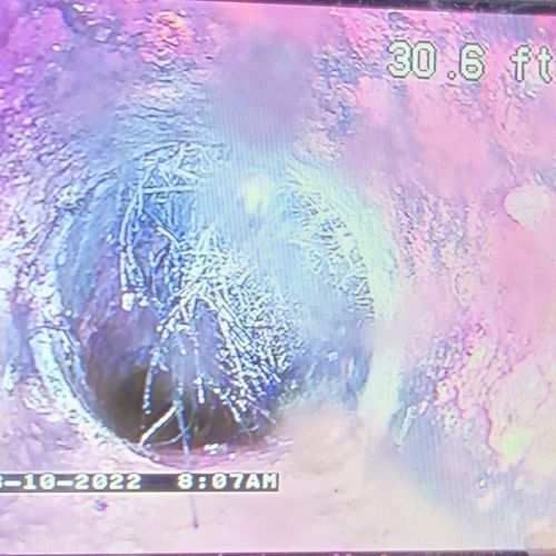 Screen shot of video showing inside a sewer line